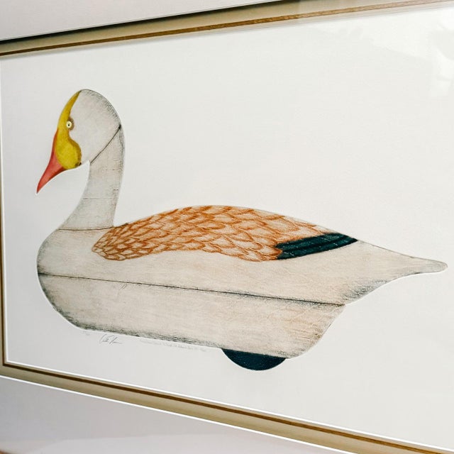 A large scale 1960 etching print under glass by Arthur Nevin depicting a Snow Goose decoy. It is inscribed Snow Goose...