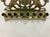 This antique brass menorah dates from around 1900. There are lions of Judea and a Star of David We are guessing of...
