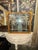 The product is a set of two early 19th century French walnut and gilt mirrors, perfect for adding a touch of elegance to...