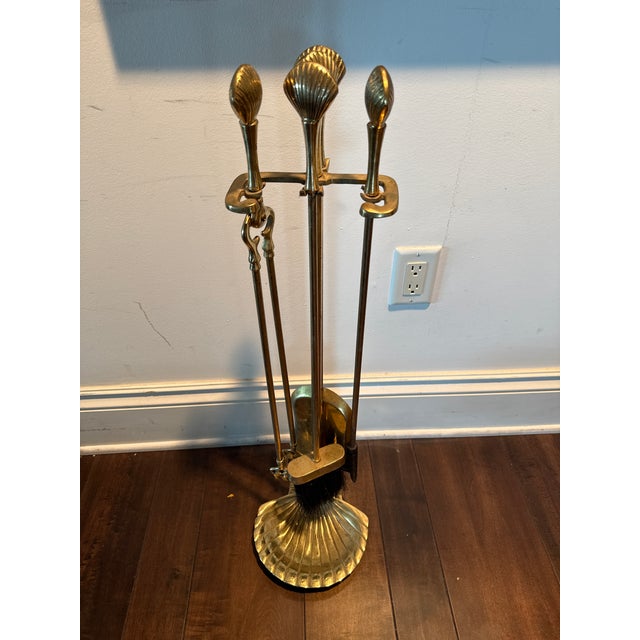Fantastic Set of Seashell or Clam motif brass fireplace tools set, with shell shape brass tool handles and larger clam...