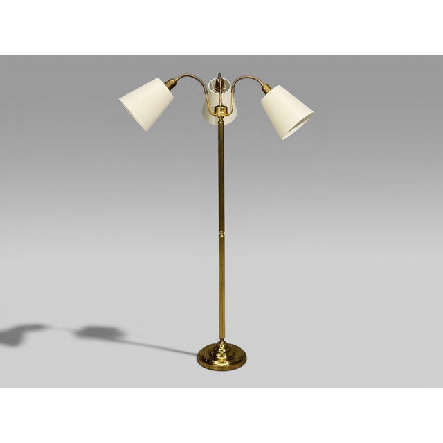 Swedish Mid-Century Modern, Three Light Floor Lamp, Reeded Brass, Fabric, Sweden, 1970s A substantial solid brass...