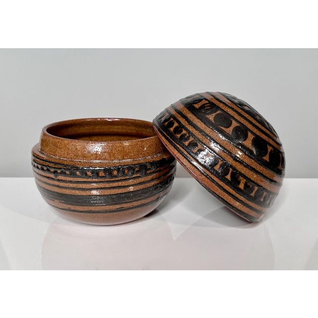 A spherical high quality studio ceramic art box, created by the renown German ceramic artist Helma Klett (1908-1996)...