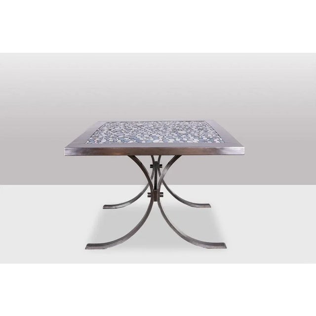 Dining Table in Polished Metal and Ceramic, 1970s, in Good conditions. Designed 1970 to 1979 This piece is designed in the...