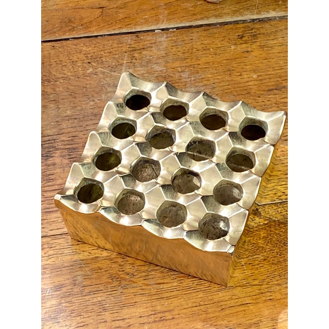 Solid brass ashtray. 1970s. Swedish design by Bo LJungberg & Holger Backstorm. An iconic model characterized by its cubic...