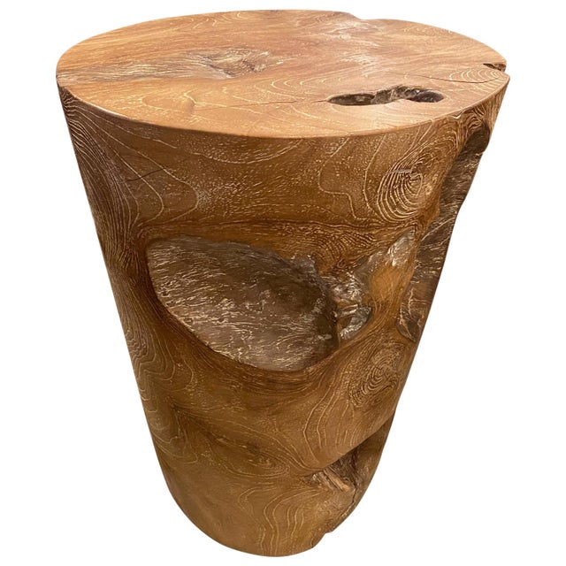 Natural teak side table or pedestal hand carved from a single reclaimed teak root with a graduation from the bottom to the...
