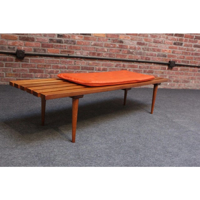Classic Mid-Century American Modern slatted oak bench or coffee table supported by four, slim, tapered legs (ca. 1950s,...