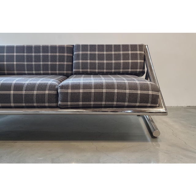 Modernist rare chrome sofa by Italian designer Plato Ginello, distinguished by its sculptural chromed steel frame and bold...