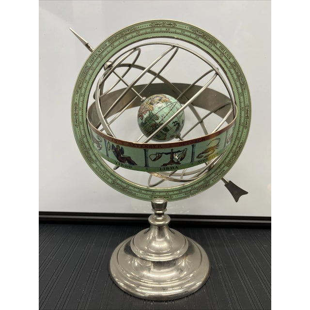 Add a touch of old-world sophistication to your home with this Vintage Mid-Century Modern Zodiac Armillary Globe. Inspired...