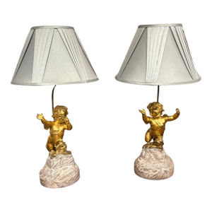 19th Century French Gilt Bronze Cherub Figures Mounted as Lamps - a Pair