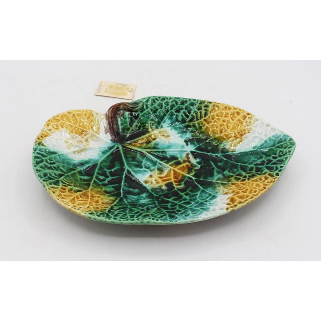 Circa 1870s English majolica begonia leaf sweetmeat dish. In rarer color palette - greens, ochre yellows & off-white...