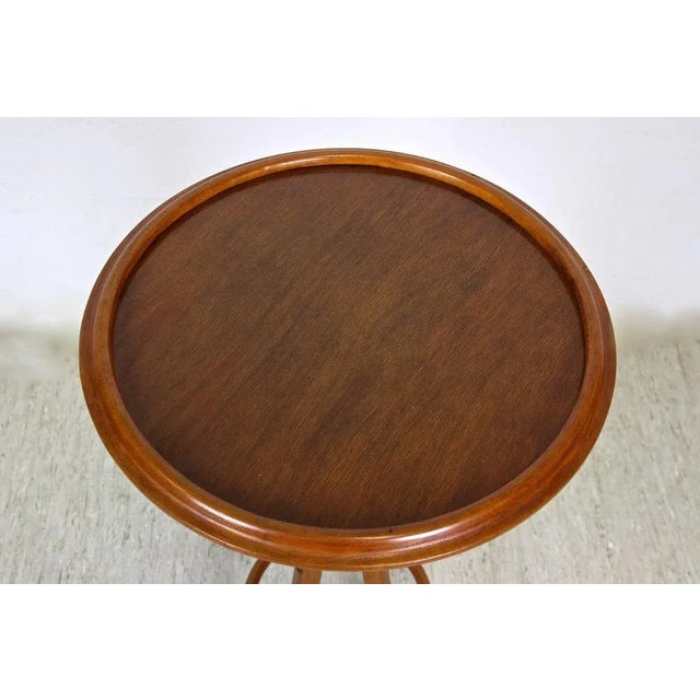 Beautiful designed Art Nouveau bentwood side table or plant stand from the early 20th century in Austria. Made of fine...