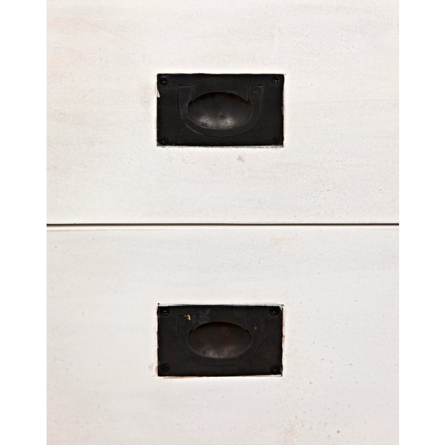 Expertly hand-carved of mahogany and finished in a clean crisp white, this remarkable side table's features include two...