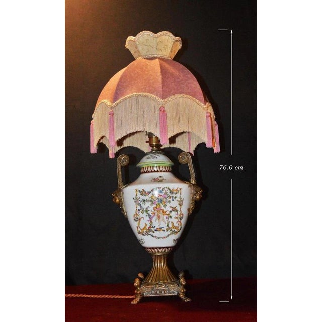 An impressive french table lamp dating to the mid-19th century, circa 1850s, centred around an elegant sèvres-style...