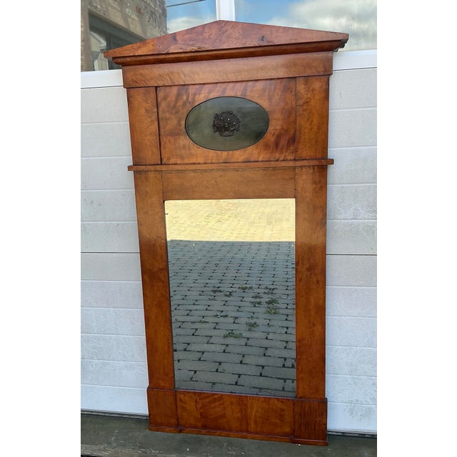 Great period Biedermeier mirror. Beautiful wood grain, classic architectural style, top has recessed ebonised oval panel...