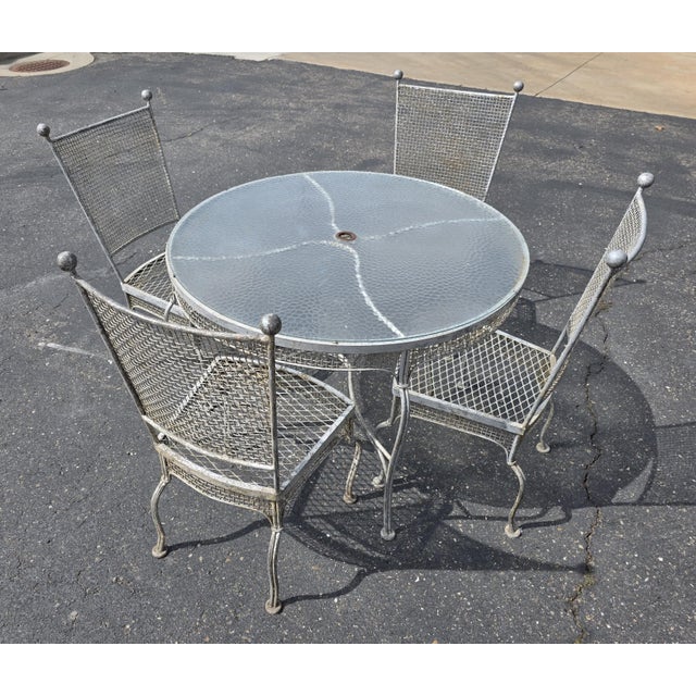 Unmarked From our Family Estate. Russell Woodard wrought iron Mesh patio glass top table and 4 chairs. Rare mid 1960's...