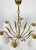 Six arm chandilier from Josef Frank, produced in the 1950's. Completely made of brass with a lovely patina. The shades...