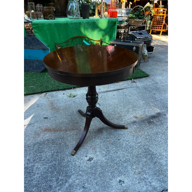 1970s Mid Century Modern Wooden Round Side Table With Brass Claw Feet For Sale In Atlanta - Image 6 of 6