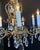 Spanish Vintage Brass Chandelier Ornate Eight Lights With Crystals For Sale - Image 3 of 8