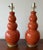 A sculptural pair of vintage triple-gourd ceramic table lamps by Festoni, finished in a rich paprika-toned high-gloss...