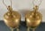 Magnificent pair of solid brass lamps from renowned Chapman Manufacturing Company. Round brass finial, concentric,...