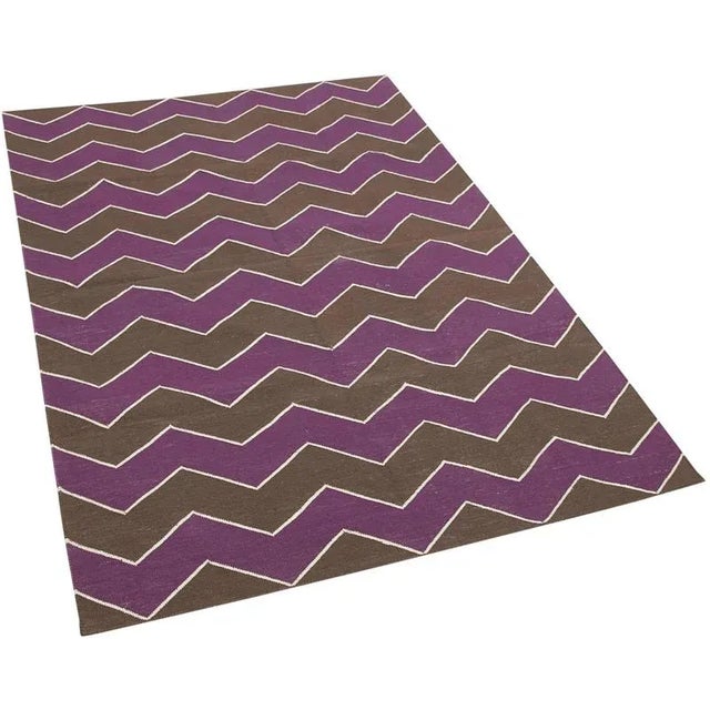 Add a touch of timeless elegance to your home with our cotton dhurrie kilim rug. Expertly flat-woven from durable cotton,...