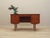 The desk was made in the 1970s, Danish production. The structure and the top are covered with teak veneer. The legs are...