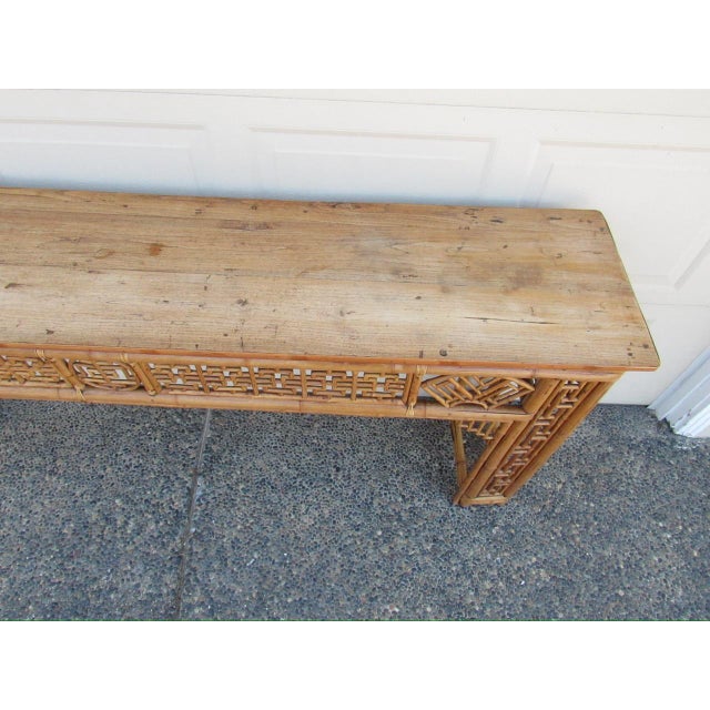 A handsome looking Chinese Chippendale style bamboo console or altar table, c.1900 Having a bleached out smooth wood...