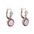 Stylish old mine cut diamond & ruby drop earrings crafted in platinum topped 14k yellow gold. Old mine cut diamonds total...