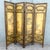 Each panel is 18”w Striking vintage Chinoiserie four-panel folding room divider featuring a warm antiqued finish and...