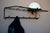 Here's a classic 1950s wall-mounted coat rack! Its black metal tube frame is both simple and stylish. At the top, a hat...