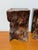 A striking pair of sculptural burl wood bookends with incredible natural movement and texture. Each piece is carved from...