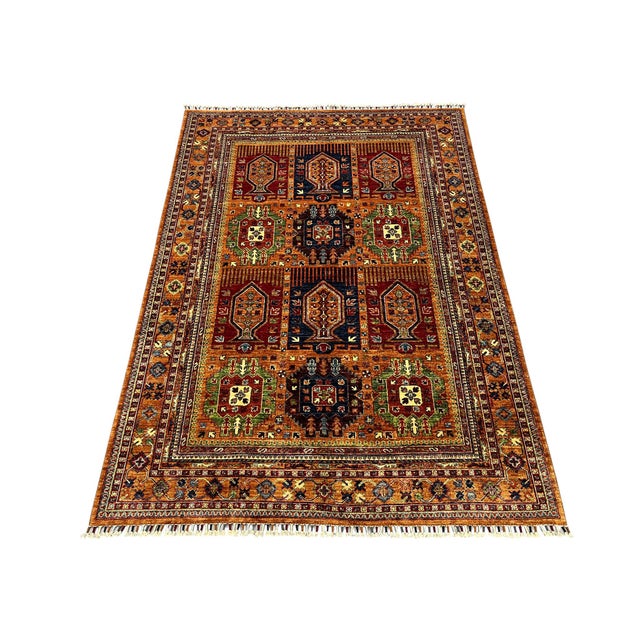 This Sultani wool rug features a garden panel design inspired by Persian Bakhtiari patterns. Rows of stylized trees and...