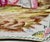 French Faience shallow tray. Raised on a rope turned base and hand-painted courting scene in the Rococo manner. Hand-...