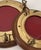 A rare matching pair of authentic brass hinged frames with original felt inserts, hardwood surrounds, and ship-grade...