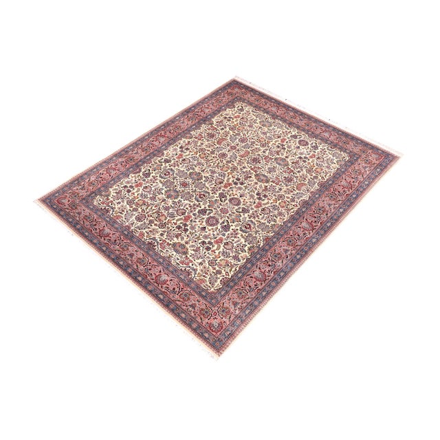 Designed with mesmerizing intricacy and gorgeous color palette, this hand-knotted masterpiece demonstrates the beauty and...