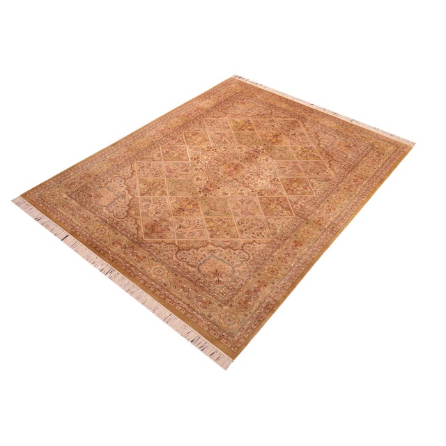 Designed with mesmerizing intricacy and gorgeous color palette, this hand-knotted masterpiece demonstrates the beauty and...
