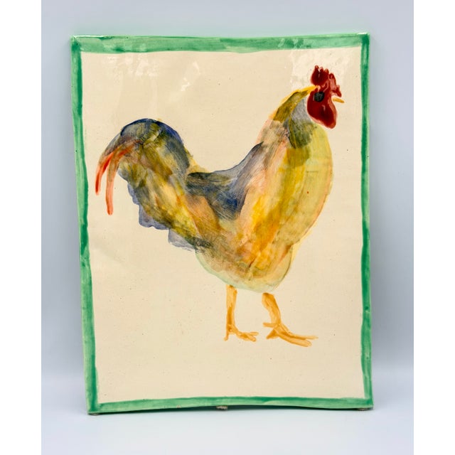 Charming Sherman Nobleman folk art ceramic tile! This exquisite piece features a beautifully hand-painted rooster,...