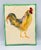 Charming Sherman Nobleman folk art ceramic tile! This exquisite piece features a beautifully hand-painted rooster,...