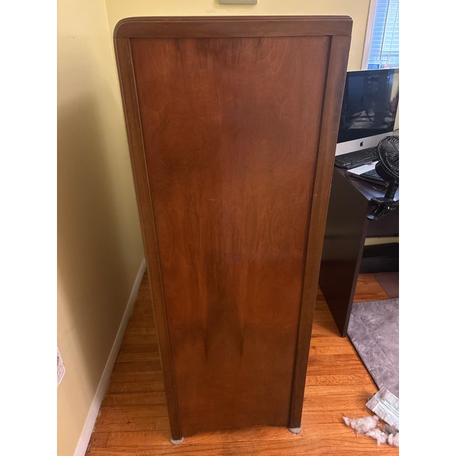 1920s waterfall armoire. Well looked after. I am the second owner. The original owner was my great grandmother. 55 inches...