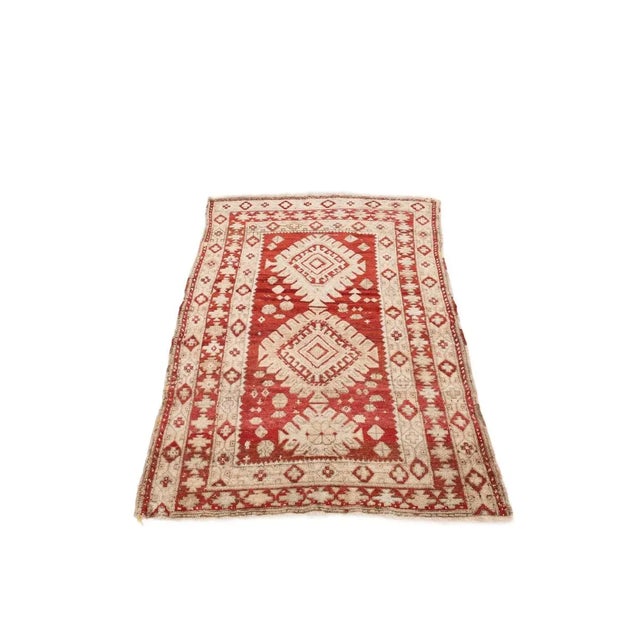 Handknotted vintage decorative wool Caucasian rug. Approximately 55-65 years old. In very good condition.