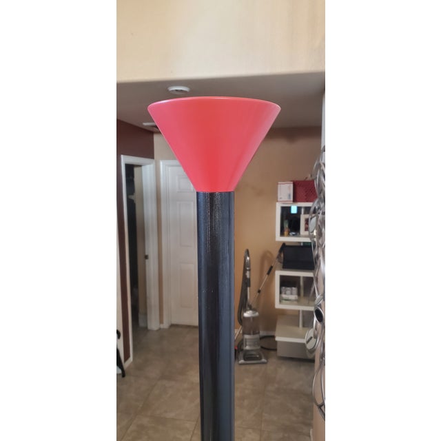 Iconic Callimaco Torchiere floor lamp designed by Ettore Sottsass for Artemide, Italy, 1989. This celebrated postmodern...