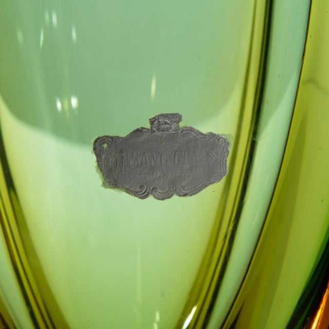 A glass vase made in 1960s Italy. This dazzling vase was made by Murano Glass, a renowned manufacturer from Venetia, a...