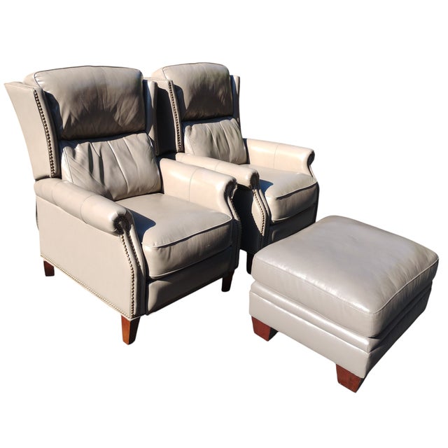 Elevate your living space with this exquisite pair of Recliners & matching ottoman Handcrafted by skilled artisans, these...