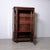Beautiful mahogany display cabinet, with a single glass door and rounded side panels, very elegant and practical. Interior...