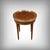 This exquisite Louis XVI style bouillotte table embodies neoclassical elegance in all its refinement. Crafted from...