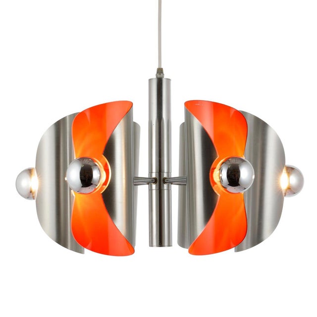 An extraordinary and rare pendant light from the space age era, the 1970s. this beautiful piece has no label, but is...