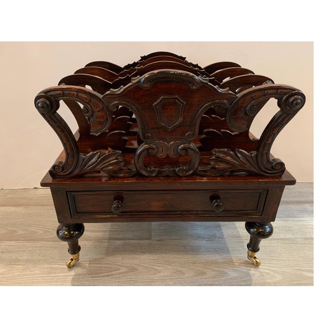 Early Victorian solid rosewood three-section Canterbury with drawer and casters, circa 1850-1860 Nicely carved design...