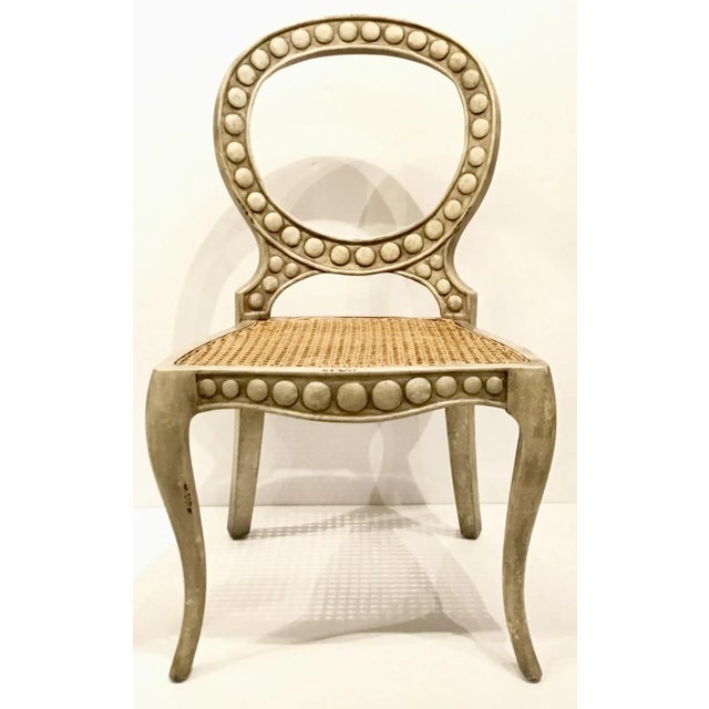 Stylish transitional White Pendant Side Chairs Set of Four, carved textured frame with caned seats, showroom floor...