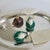 Set of 3 tiny Christmas Ornaments. Two Patricia Breen Ladybug Noel Ornaments in Green. One side is a ladybug the other...