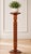 A classic mahogany pedestal stand featuring a beautifully turned barley twist column, round top, and circular base. The...